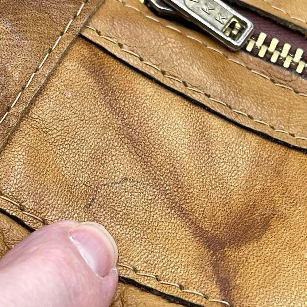 Vintage boho Leather Made in Hong Kong top handle bag.